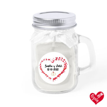 Vela aromática en recipiente de cristal con asa y diseño "corazón de corazones"